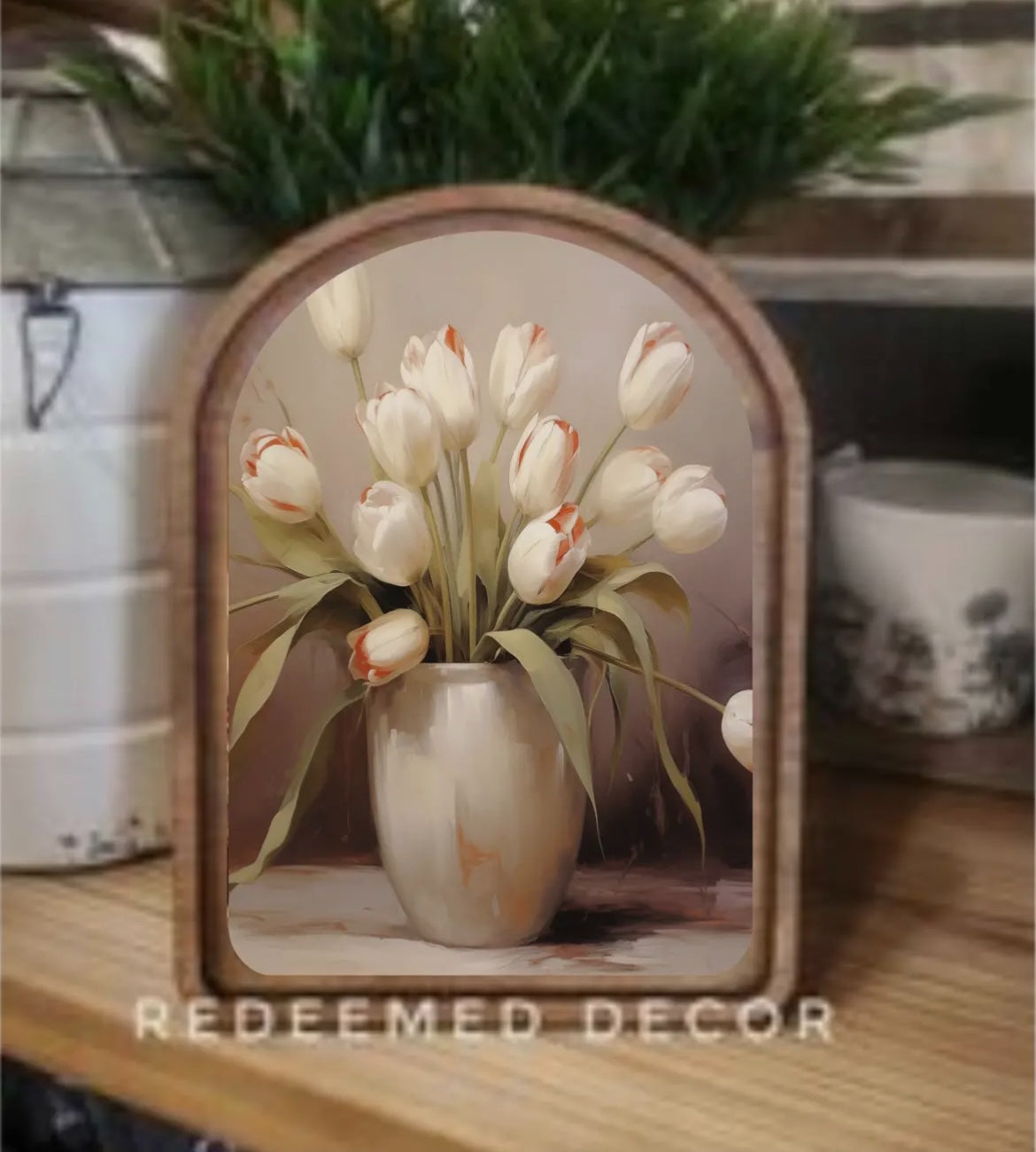Arched canvas print of cream tulips with coral tips in a neutral vase, framed in wood by Redeemed Decor.