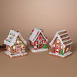 Candy Stripe Gingerbread Girl House: Lighted gingerbread house with candy‑stripe walls, gumdrop roof accents, and a gingerbread girl at the door.

Santa’s Candy Cottage: Lighted gingerbread house with Santa at the door, round candy windows, and peppermint roof accents.

Holiday Tree Gingerbread Man House: Lighted gingerbread house with green Christmas trees, red‑and‑white candy accents, and a gingerbread man at the door.
