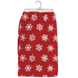 A red towel with a white snowflake pattern, hanging on a white plastic hanger against a plain white background.