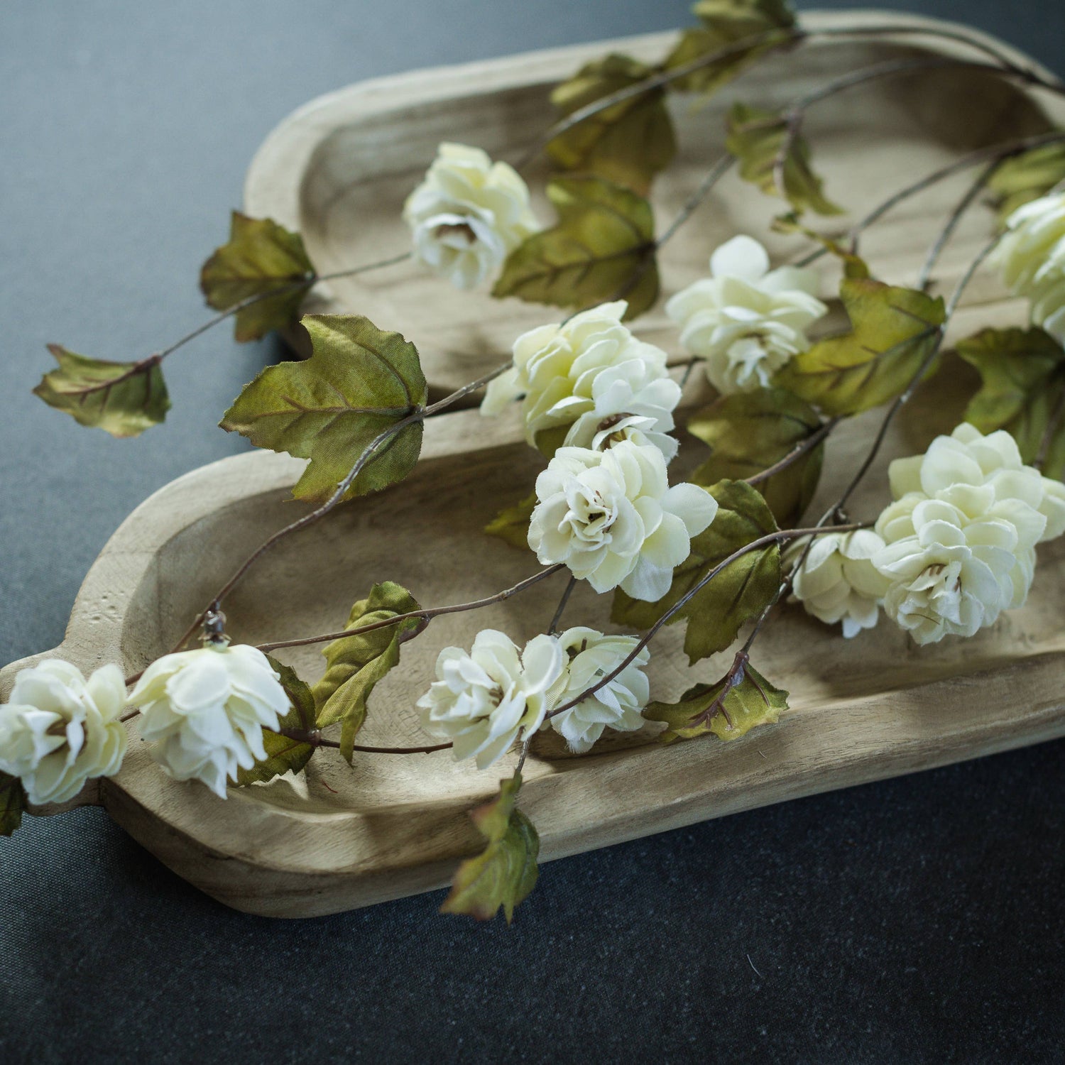 Cream 39-inch faux hops stem with draping clusters and wired stem for shaping.