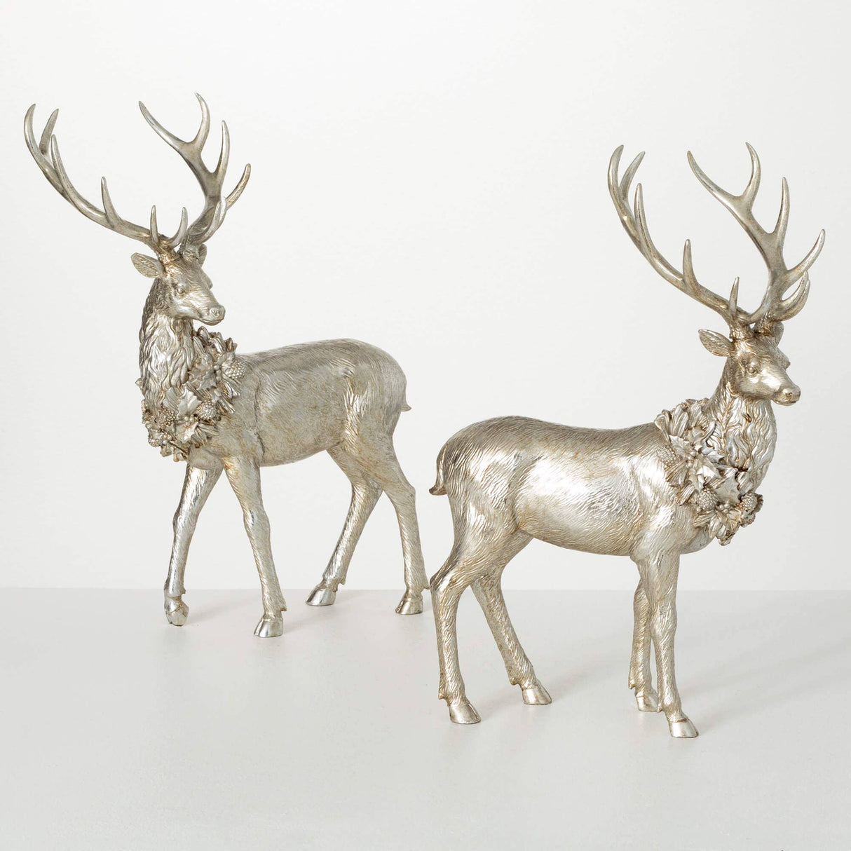 Champagne Deer Figurine Set – Elegant Resin Holiday Sculptures (Set of 2)