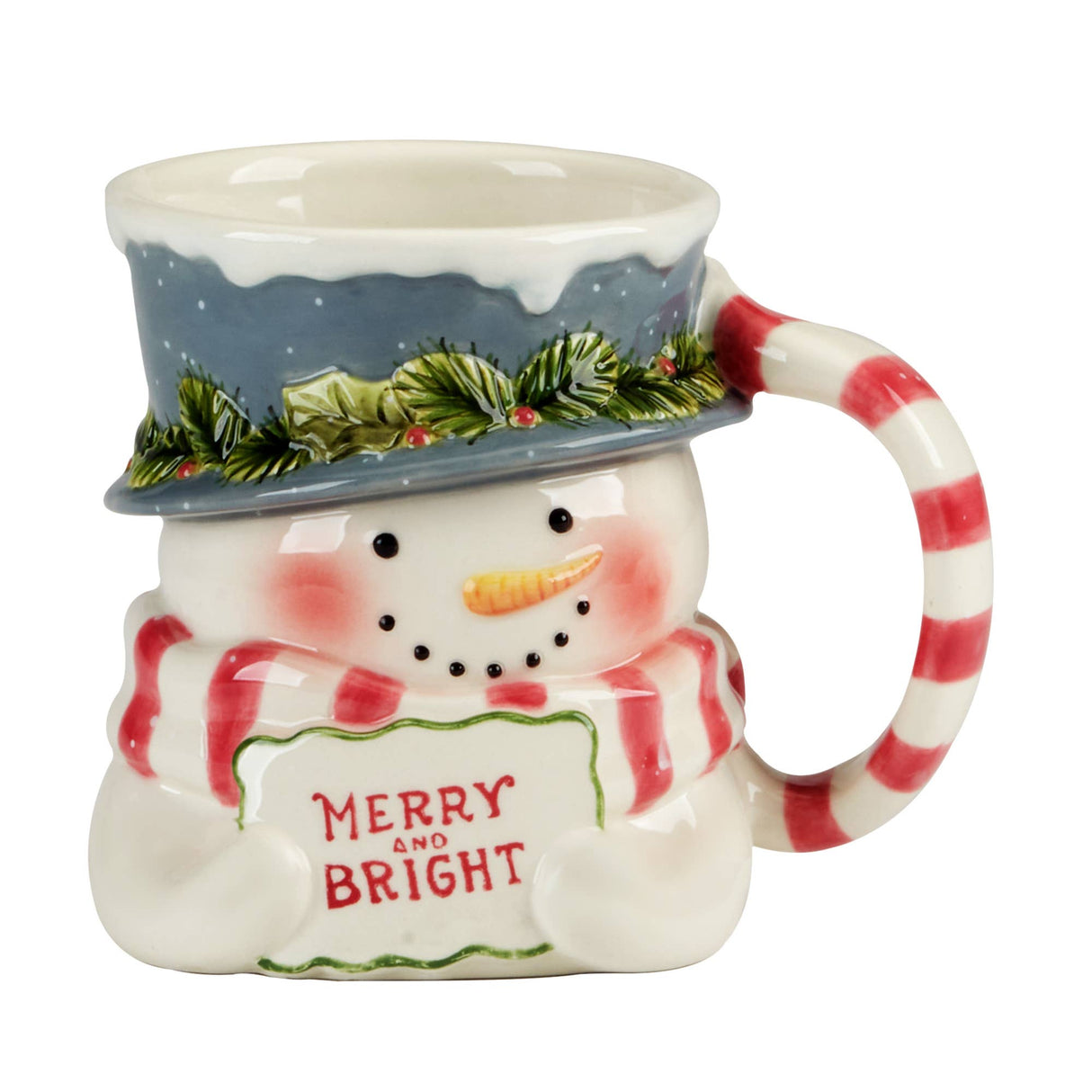3‑D ceramic snowman mug with blue hat, holly accents, striped red scarf handle, and “Merry and Bright” sign, designed by Wendy Wiinanen.