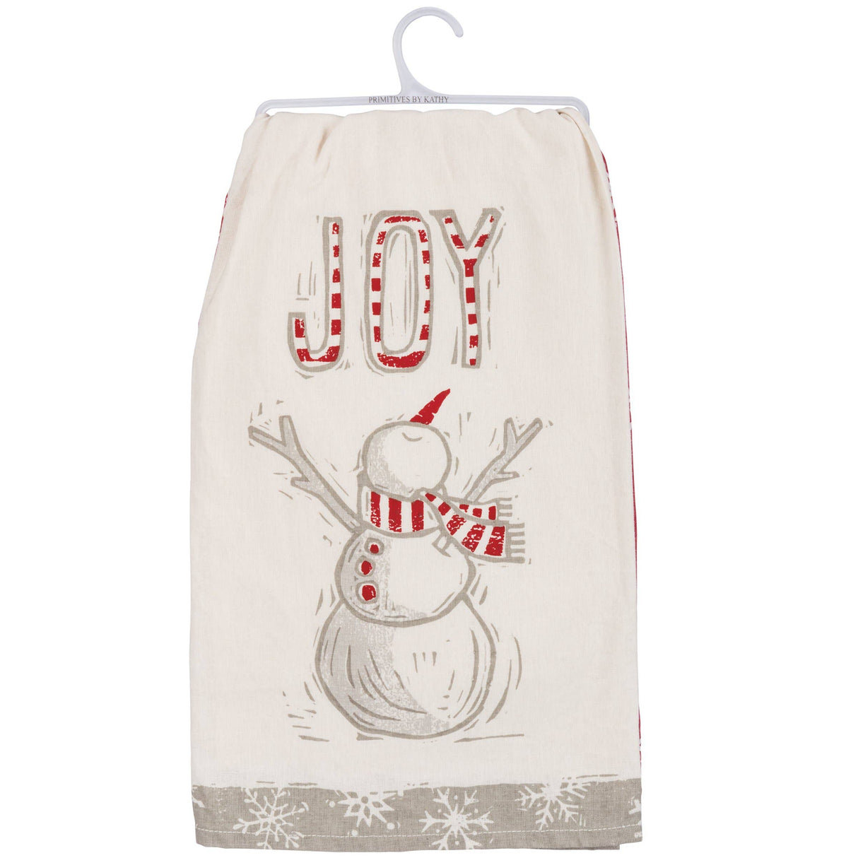 A cream-colored fabric tea towel hanging on a white plastic hanger. The towel features a hand-drawn style snowman wearing a red and white striped hat and scarf, with the word 'JOY' written above in a red-and-white striped font.
