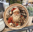 8-inch round canvas featuring a classic Santa holding holly and a gift.