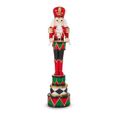 18-inch multicolor nutcracker drummer in red uniform with gold accents, white hair, and tiered drum pedestal; made of natural stone powder