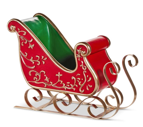 14.5-inch red and green vintage Christmas sleigh with ornate gold scrollwork and curved runners, styled for holiday vignettes