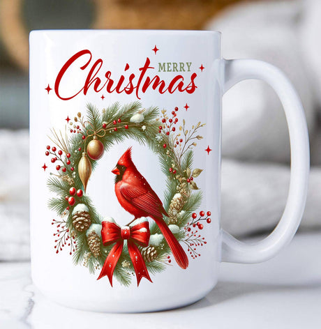 15oz ceramic Christmas mug with cardinal perched inside a holiday wreath and “Merry Christmas” text.