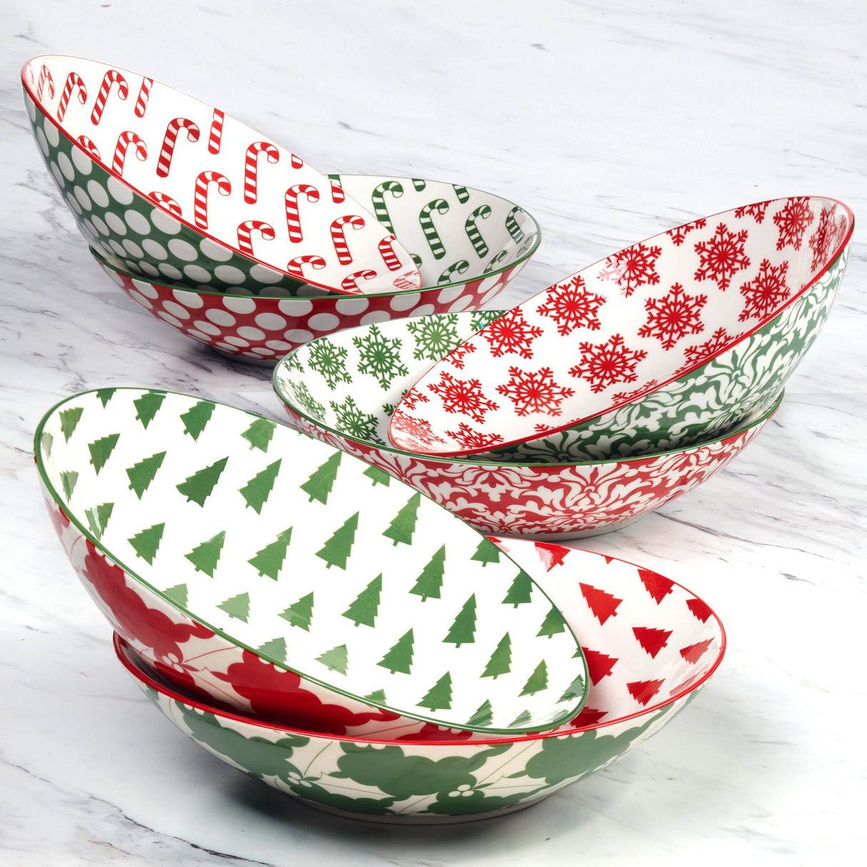 Winter Medley 9.25" porcelain dinner bowl with assorted red and green Christmas patterns, decorated inside and out, by Certified International