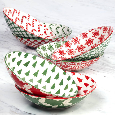 Winter Medley 9.25" porcelain dinner bowl with assorted red and green Christmas patterns, decorated inside and out, by Certified International