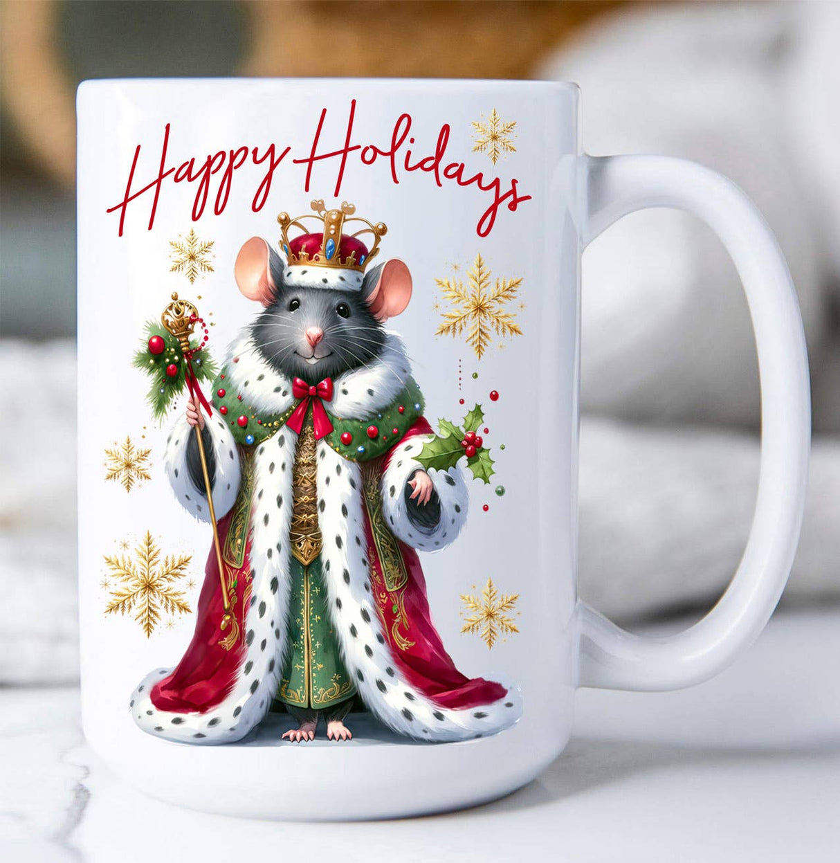 White mug with a decorative Mouse King illustration wearing a crown and festive attire, surrounded by snowflakes and the text 'Happy Holidays'.