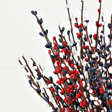 Three patriotic pip berry picks with red, white, and navy berries arranged against a white background.