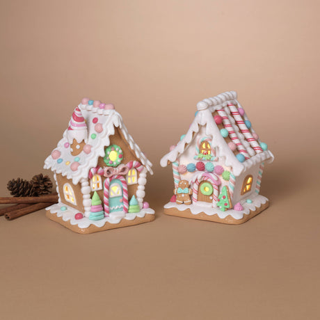 Pastel Peppermint House: Pastel gingerbread house with peppermint‑swirl roof topper, candy‑striped door, and warm glowing windows.

Pastel Candy Cane House: Pastel gingerbread house with candy‑stick roof trim, gingerbread man out front, and warm glowing windows.